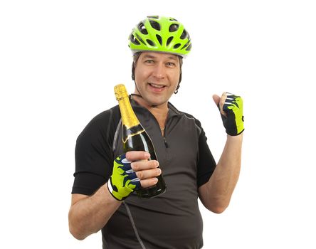 Portrait of a cyclist who has won the race with champagne in hand over white background