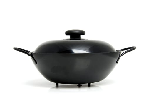 Black wok pan isolated on white background