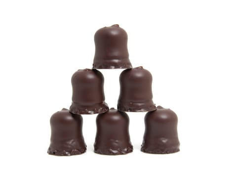 pile of chocolate candy isolated on white background