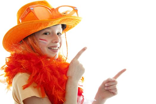 portrait of a young girl as soccer supporter is pointing over white background