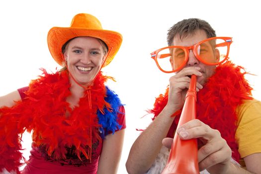 Two Dutch soccer fans in orange outfit cheering for the WK games, over white background