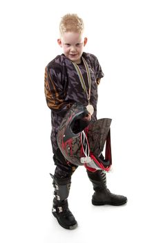 Young motor race boy is posing over white background