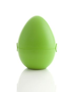 Bog green toy egg isolated on white background