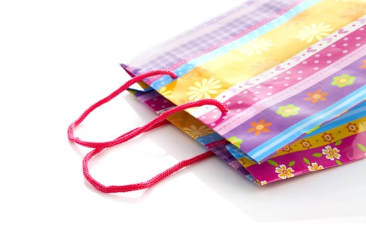 Colorful shopping bag isolated on white background