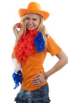 portrait of Dutch soccer fan in orange outfit over white background