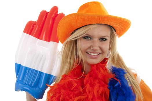 portrait of Dutch soccer fan in orange outfit with big glasses, hat and big hand over white background