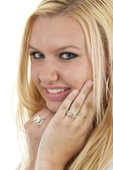 portrait of young blonde woman in closeup over white background