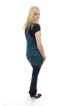 Young blonde woman is posing over white background