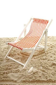 Beach chair on sand over white background