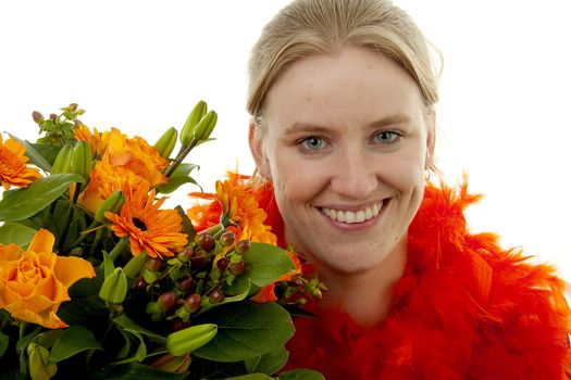 Woman with beautiful orange flowers in closeup over white background