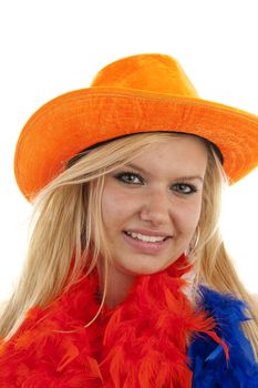 Portrait of Dutch soccer fan in orange outfit posing over white background