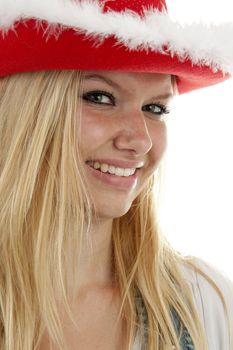 portrait of a woman with christmas hat in closeup over white background
