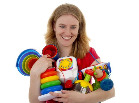 Woman with lots of colorful toys is looking happy over white background