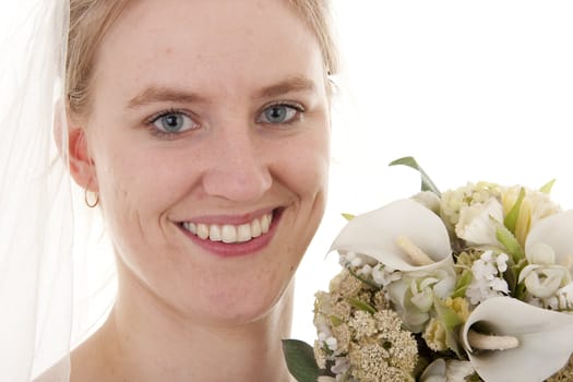 portrait of Young beautiful bride posing over white background