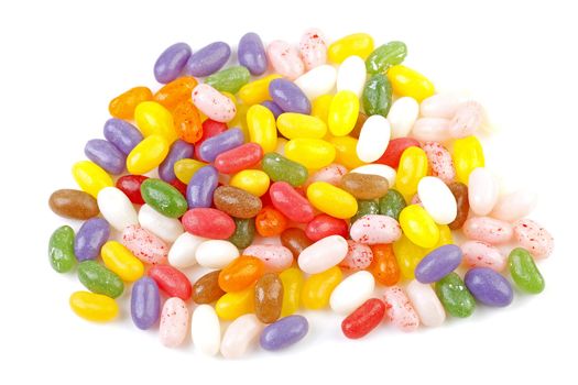 Colorful jelly beans candy in closeup over white background