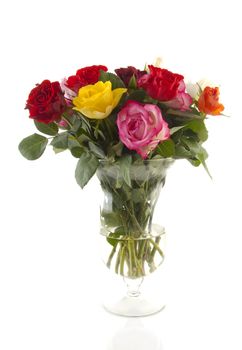 Bouquet of colorful roses in vase over white background