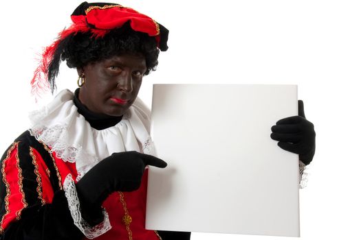 Zwarte piet ( black pete) typical Dutch character part of a traditional event celebrating the birthday of  Sinterklaas in december over white background is holding empty text board