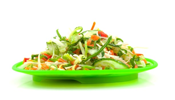 Green fresh lettuce salad on plate over white background
