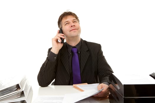 Businessman at work is calling on the phone over white background