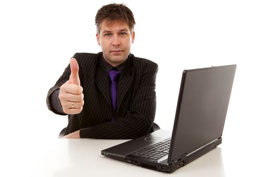 Businessman is pleased, holding thumbs up, over white background