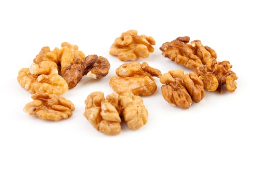 pieces of walnut isolated on white background