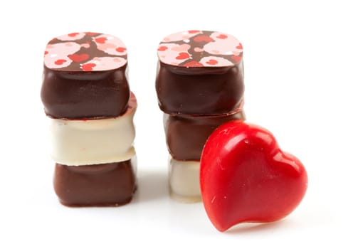 pile of chocolate bonbons isolated on white background