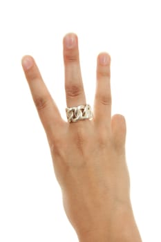 Woman's hand is counting number 3 over white background