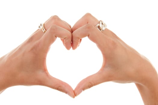 Woman's hands in the shape of hearts over white background