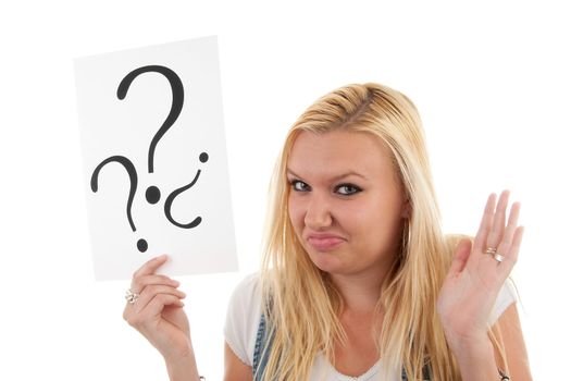 Woman is holding board with question marks over white background
