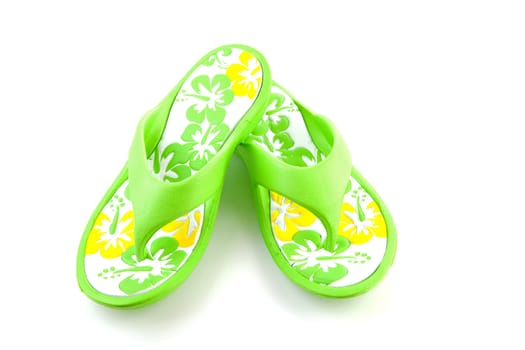 Green summer slippers isolated on white background