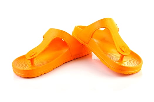 orange summer slippers isolated on white background