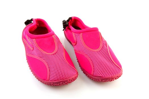Pair of pink water shoes isolated on white background