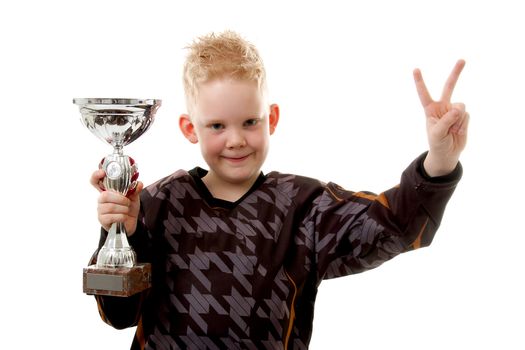 Little boy has won the second place trophy cup over white background