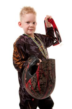 Young motor race boy is posing over white background