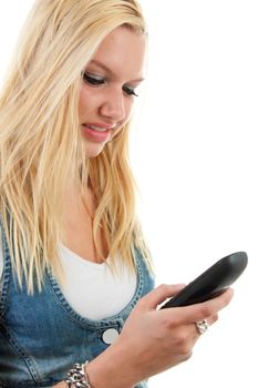 Young blonde woman is dialing on the phone over white background