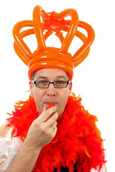 Dutch soccer supporter with big orange blown up crown over white background
