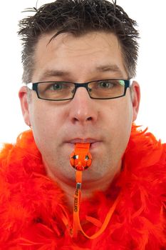 Dutch soccer supporter in orange outfit with flute over white background