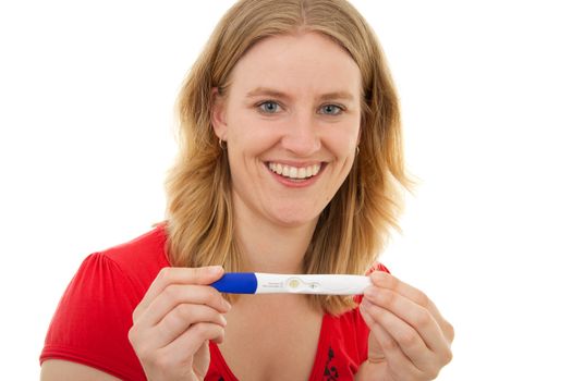 Woman is showing pregnancy test over white background