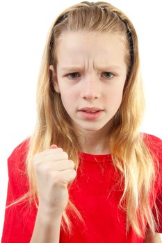 Angry girl in closeup making fist over white background