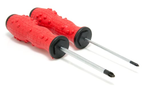 two red screwdrivers isolated on white background