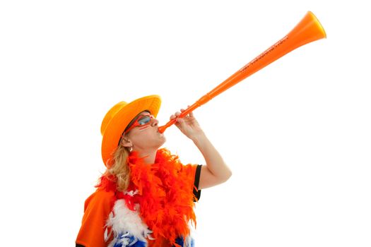 Female Dutch soccer supporter with orange plastic vuvuzela over white background