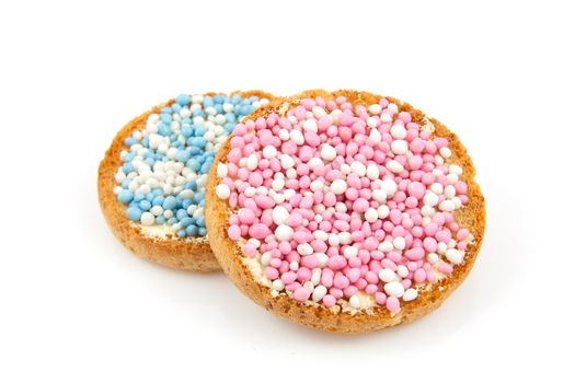 two rusk with blue and pink mice over white background