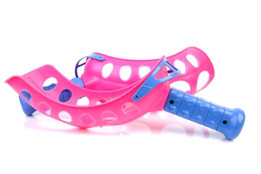pink plastic play toys for catch ball over white background