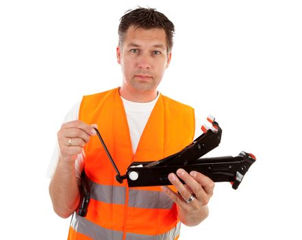 man in safety vest holding car breakdown jack over white background