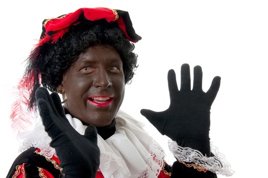 Happy Zwarte piet ( black pete) typical Dutch character part of a traditional event celebrating the birthday of  Sinterklaas in december over white background