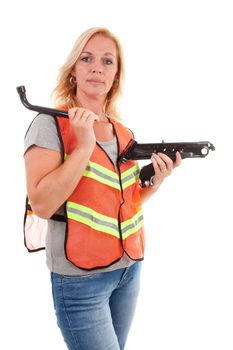Woman in safety vest holding car breakdown jack over white background