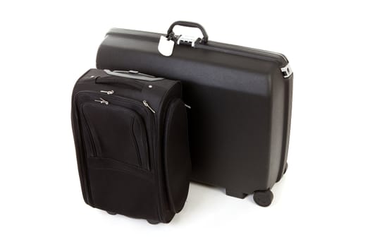 Two black suitcases isolated on white background