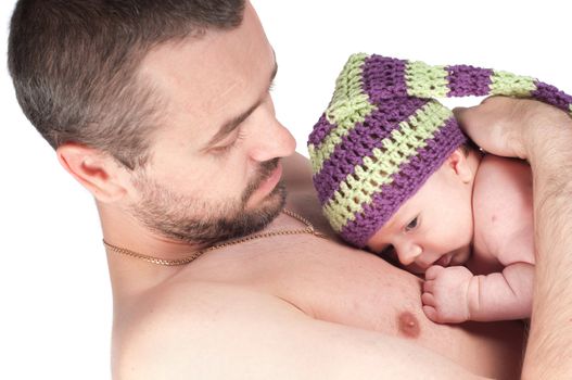 Shot of newborn baby on dad's hands