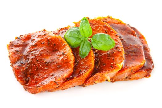 raw juicy steaks with sauce isolated on white background