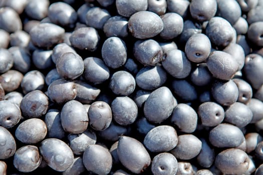 group of black olives can be used as background